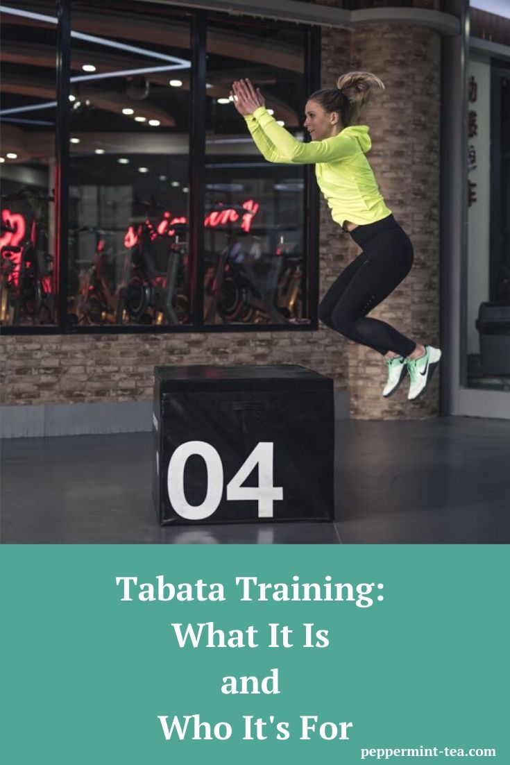 Photo of woman doing box jumps, which could be a type of Tabata training